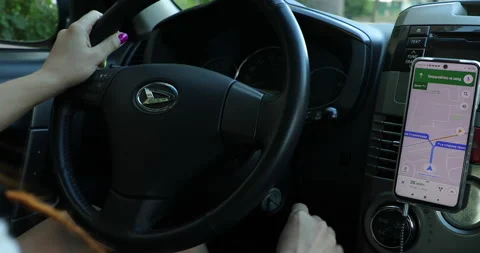 Girl inserts the ignition key and starts the car Stock Footage 135487951