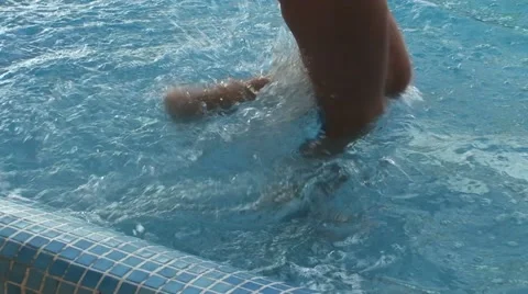 Girl jogging in the pool smiling Stock Footage 41421976