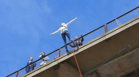 Girl jumping from the back bridge Stock Footage 61209459