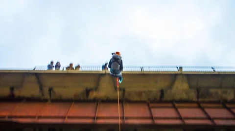 Girl jumping from the bridge backwards Stock Footage 45991262