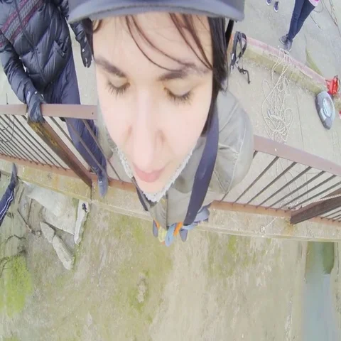 Girl jumping from the bridge forward in the first person Stock Footage 69538368