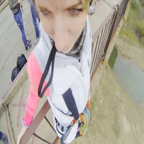 Girl jumping from the bridge forward in the first person Stock-Footage 69539865