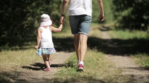 Girl is jumping with dad Stock Footage 55328641