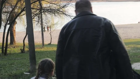 Girl is jumping with dad Stock Footage 74618923