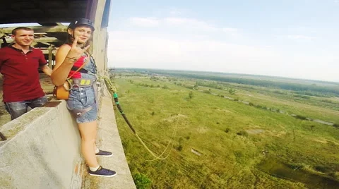 Girl jumping facing forward Stock Footage 68068566