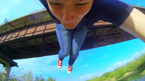 Girl jumping facing forward, smiling Stock Footage 47821824