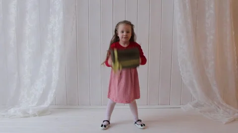 Girl Jumping with Gift Box Stock Footage 57891120