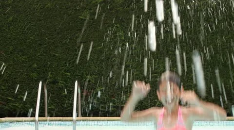 Girl jumping in pool Video stock 11884489
