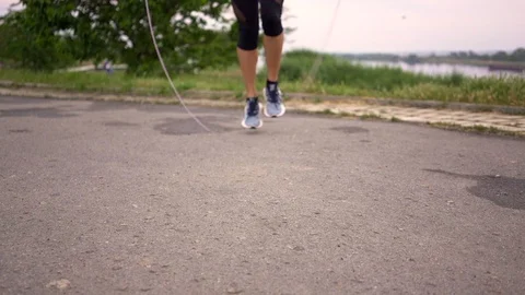 A girl jumping on a rope Stock Footage 110841775