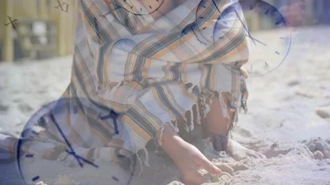 Girl kneeling, digging sand, camera pulling back, girl adjusting wrap, clock Stock Footage 328330818
