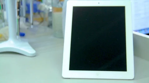 Girl in lab with tablet 02 Stock Footage 89568137