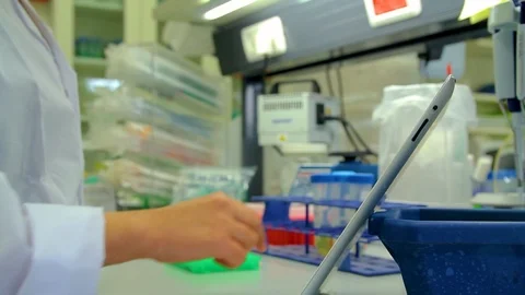 Girl in lab with tablet 03 Stock Footage 89568182