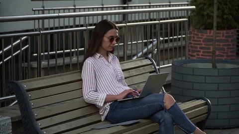 Girl with laptop Stock Footage