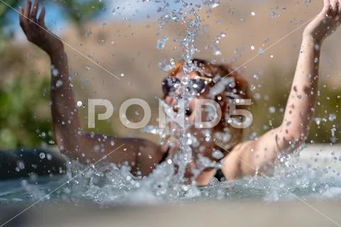 Girl laughing in hot tub Stock Photos