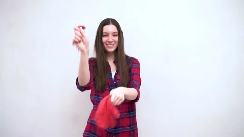 Girl laughs and waves gloves Stock Footage 201609072