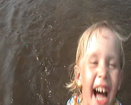 Girl laughs in river Video stock 11361965