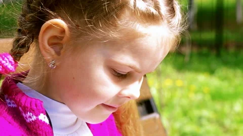 Girl leafing through a book close up Stock Footage 62925249