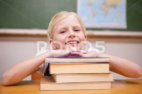 Girl leaning on books Stock Photos