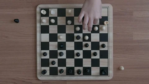 A girl learn how to play chess game. Top view Stock Footage 119916564