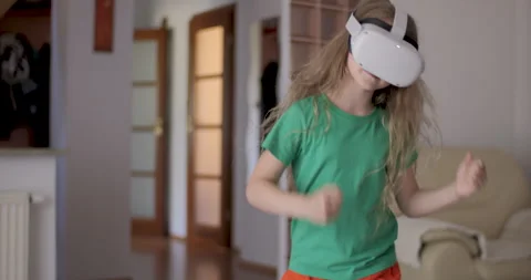 Girl Learning Dancing Using Virtual Reality Headset. Modern Active Child in.. Stock Footage 339303492