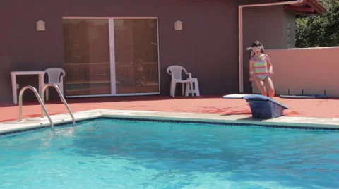 Girl Learning to Dive 2 Stock Footage 58837551