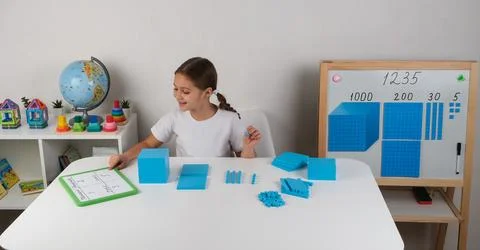 Girl Learning Math with blue Geometric Figures Stock Photos