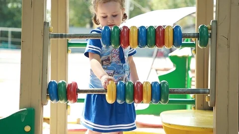 Girl learns to count Stock Footage 91955218