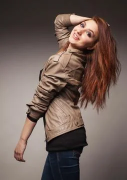Girl in a leather jacket represents model Stock Photos