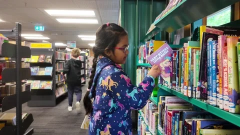 A Girl in Library 1 Stock Footage 327614447