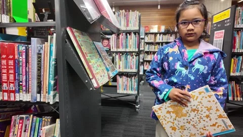 A Girl in Library 2 Stock Footage 327614417