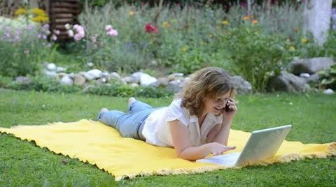 Girl lies on a meadow Stock Footage