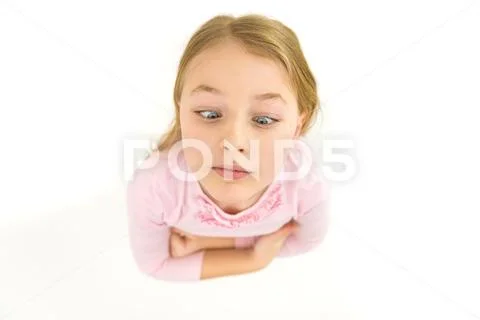The girl look to the camera. View from above Stock Photos