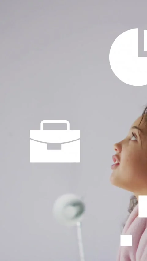 Girl looking up and smiling while business icons appearing and resizing, Video stock 334604810
