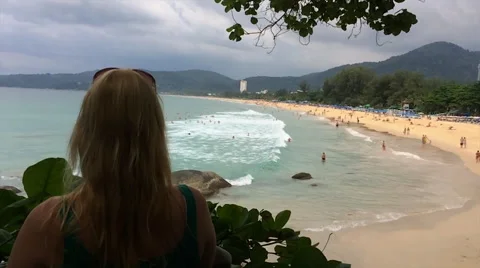 Girl looking at the beach Stock Footage 50052588