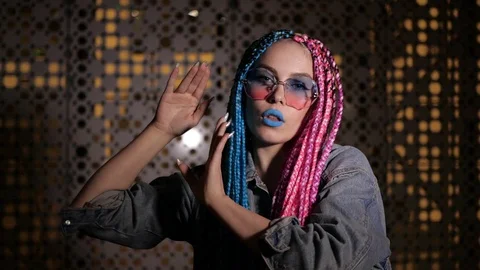 Girl is looking at camera dancing outside Stock Footage 92453085