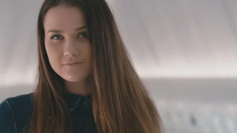Girl is looking into the camera Stock Footage 77410361