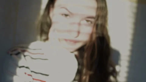 The girl is looking at the camera. Vídeo Stock 98261066