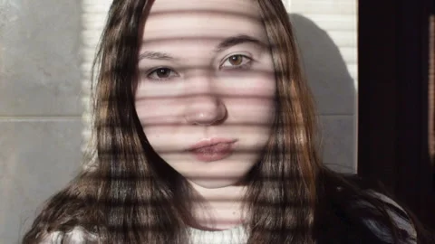 The girl is looking at the camera. Vídeo Stock 98275075