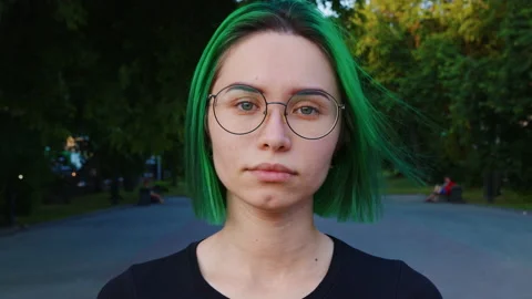 Girl looking at camera, smiling Stockbeeldmateriaal 201890643