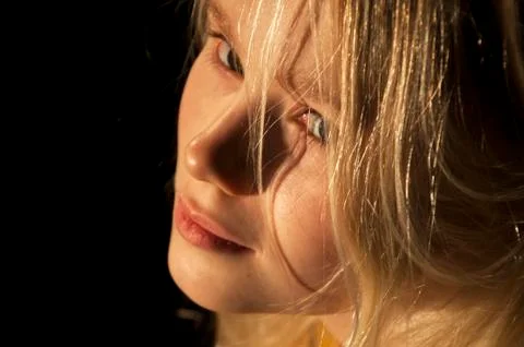 Girl looking at camera in studio Stock Photos