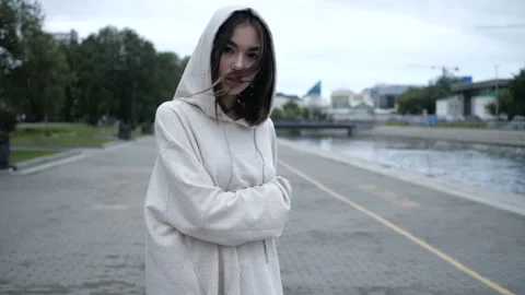 Girl is looking at camera while walking Video stock 91894004