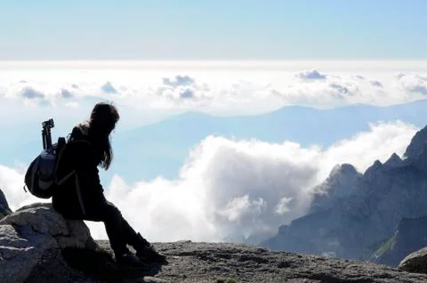 Girl looking at clouds Stock Photos