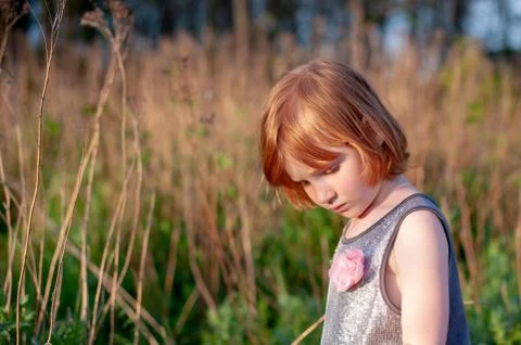 Girl looking down Stock Photos