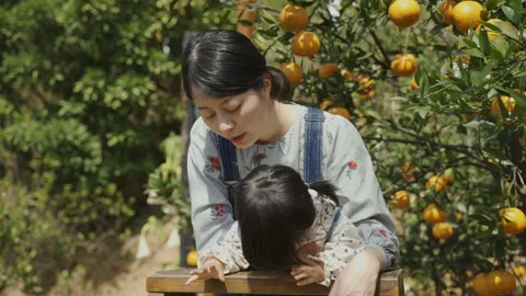 Girl looking downward at the ground Video stock 172201928