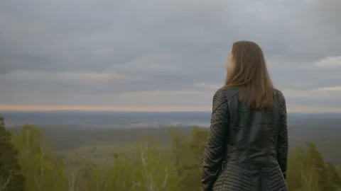 Girl is looking on forest Video stock 91190665