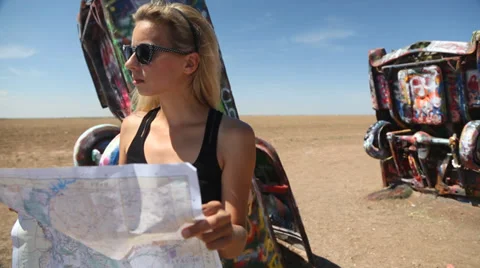 Girl Looking at the Map Stock Footage 36751106