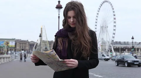 Girl looking map in Paris Stock Footage 64054869