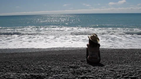 Girl looking out on Beach 스톡 동영상 33127329