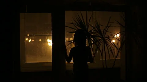 Girl looking out the window Stock Footage 42878940