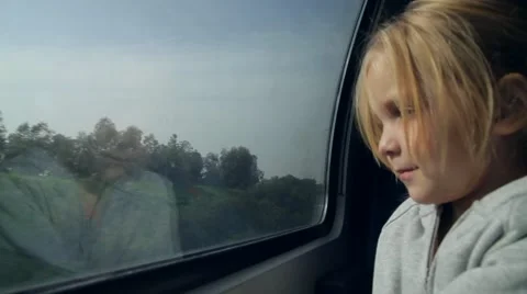Girl looking out the window on the train Stock Footage 46226711
